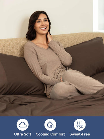 CGK Unlimited sheets next to memory foam topper highlights topper compatibility and comfort.
