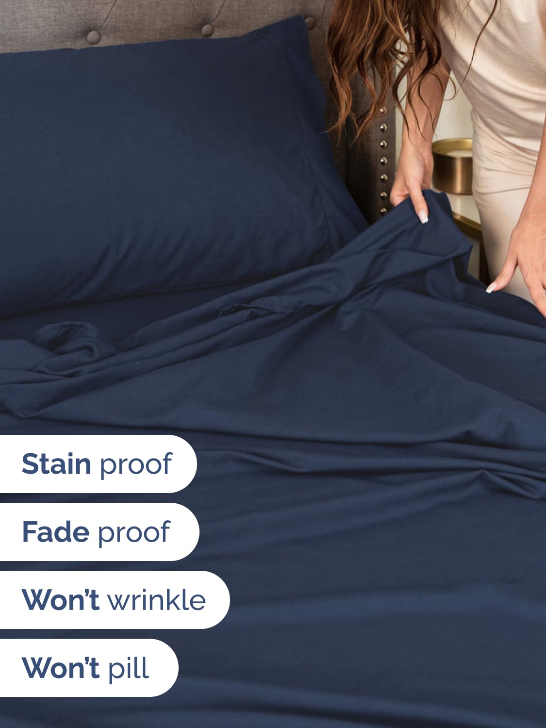 CGK Unlimited navy blue deep-pocket fitted sheet over a mattress with topper