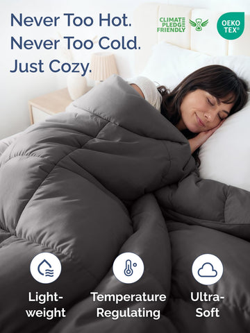CGK Unlimited queen-size dark gray comforter on bed for a cozy night