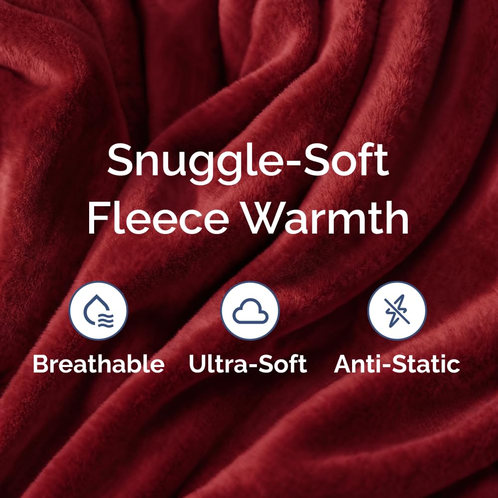 CGK Unlimited queen size fleece blanket folded on couch for layering