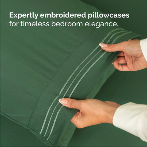 CGK Unlimited emerald green sheets on a bed with a cool, silky surface.