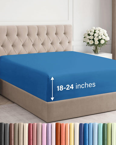 CGK Unlimited royal blue king fitted sheet on bed demonstrates a deep mattress fit