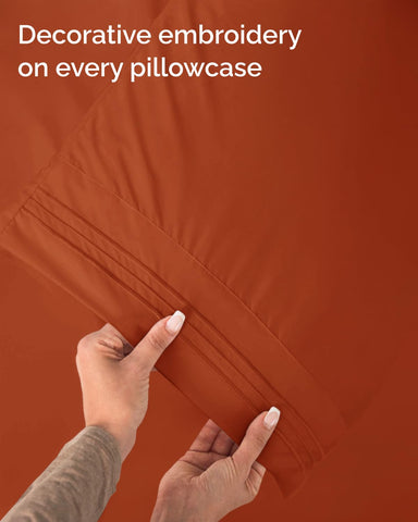 CGK Unlimited terracotta color sheet set adds warm tone to bedroom