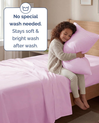 CGK Unlimited twin sheet set light pink color adds inviting bedroom style.