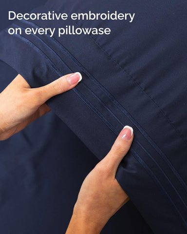 Navy CGK Unlimited sheets offer hotel-luxe comfort and versatility
