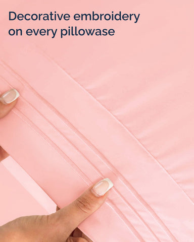 CGK Unlimited baby pink shade adds a soft, inviting look to a bedroom.