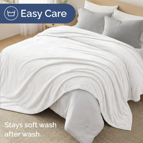 CGK Unlimited versatile blanket used on bed, couch, and for travel scenes