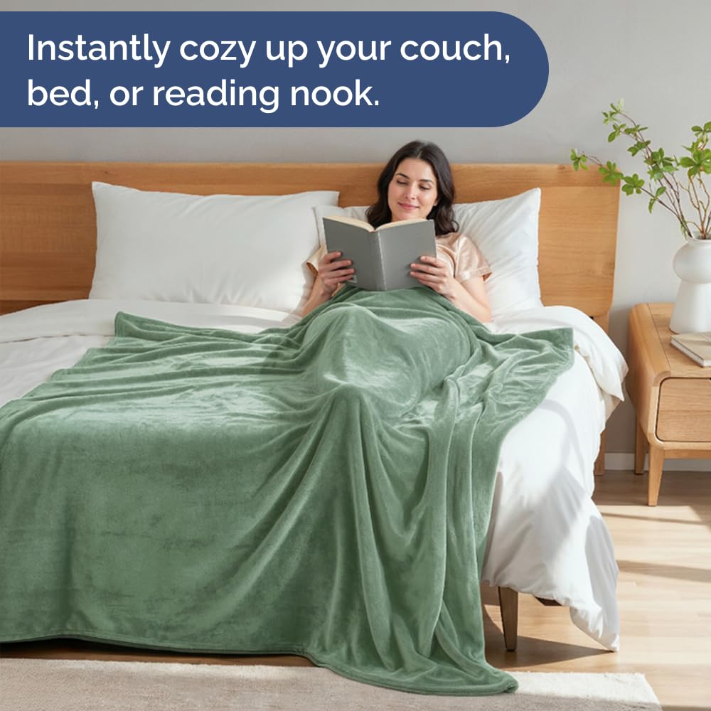 CGK Unlimited versatile blanket on couch for lounging or travel