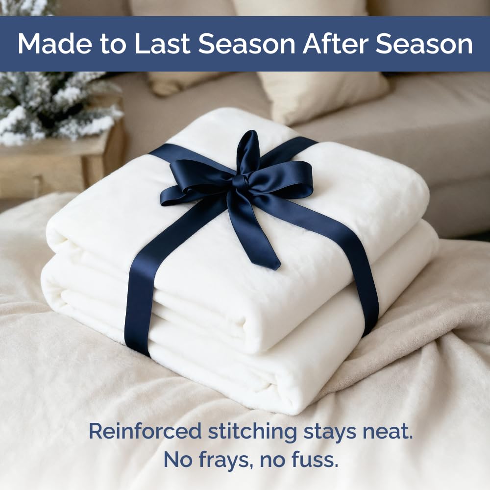 White CGK Unlimited fleece blanket enhancing a clean bedroom decor