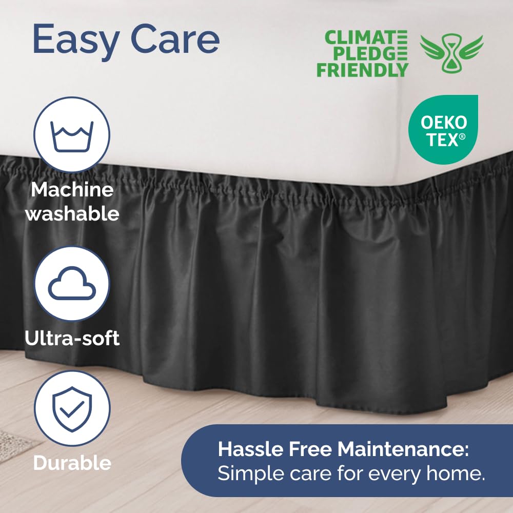 CGK Unlimited black bed skirt covers under-bed storage for a neater look.