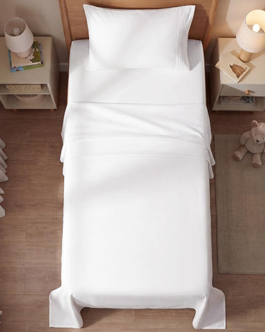 Wrinkle-free appearance of CGK Unlimited sheets on a neatly made bed