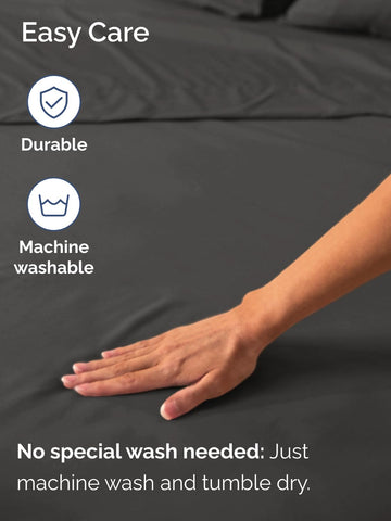 CGK Unlimited wrinkle-resistant charcoal king sheet keeps a tidy look.