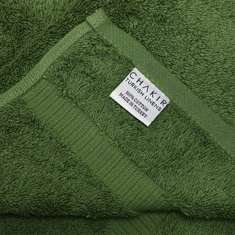 Chakir Turkish Linens four-towel set in use, generous 30x60 size for bath and spa routines.
