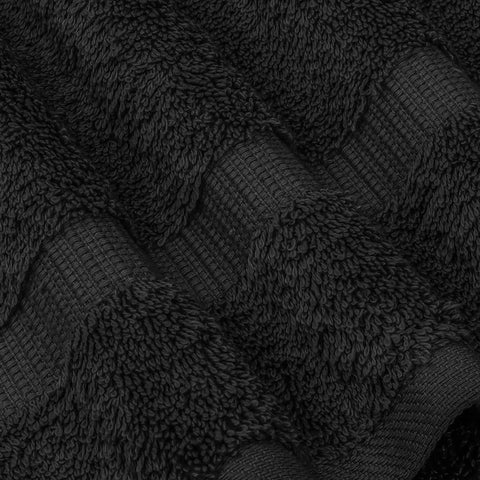 Chakir Turkish Linens black towel enhances home spa experience with hotel-grade softness.