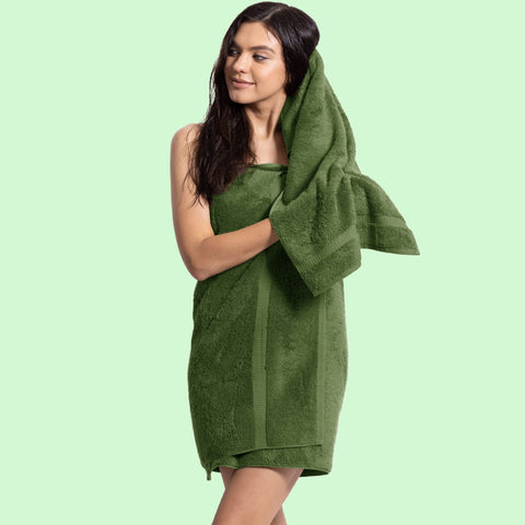 Chakir Turkish Linens Moss four-towel set shown for a full bathroom refresh.