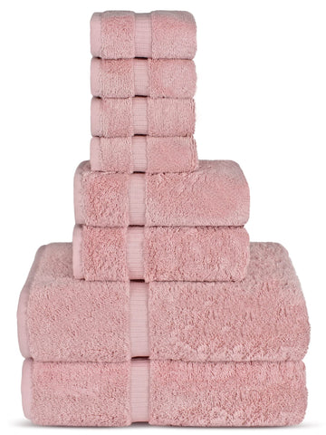 Chakir Turkish Linens pink bath towels stacked, spa-like softness and absorbent feel.