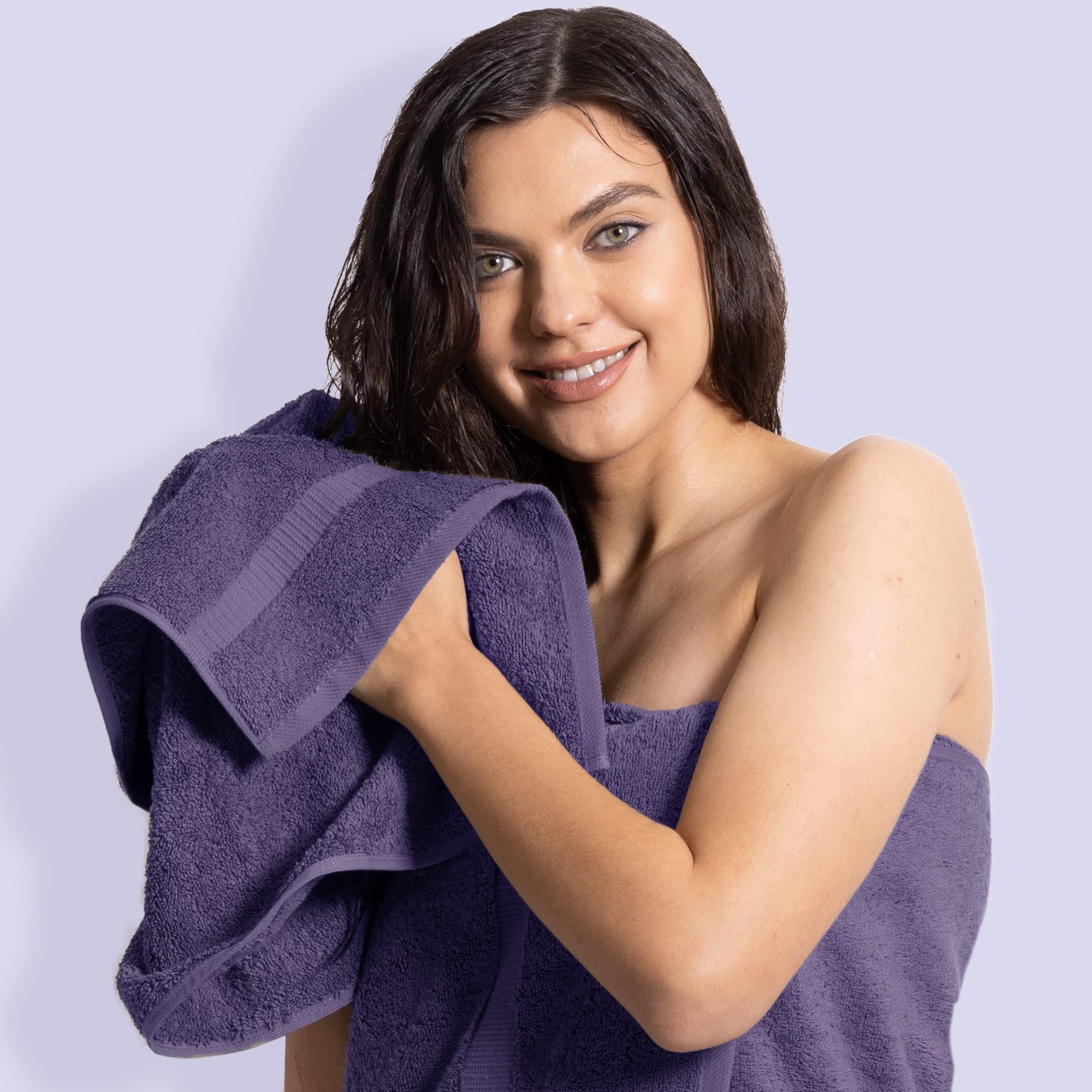 Chakir Turkish Linens plum towel weave detail, showing double-stitched edge for durability.