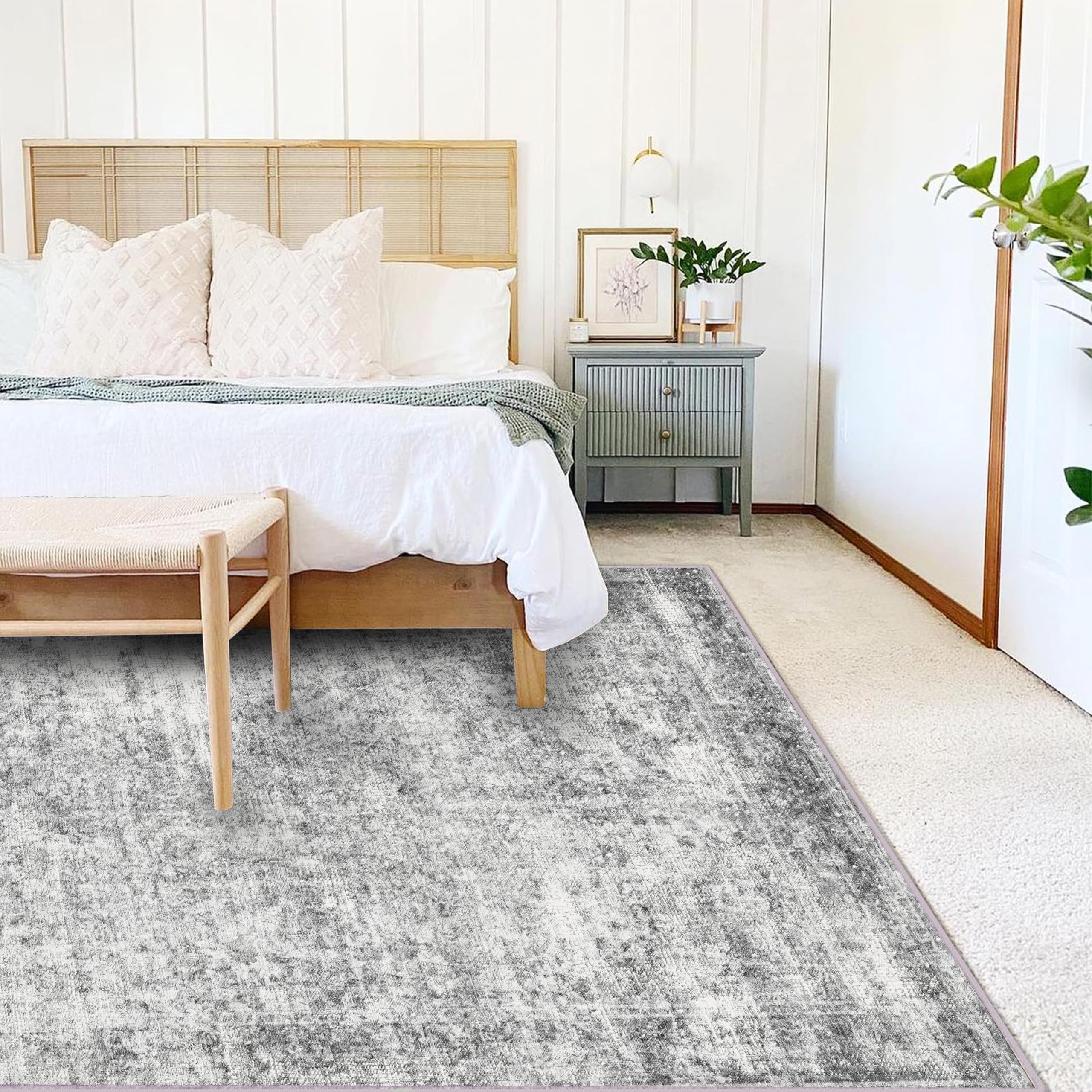 CHAMPLANT area rug close-up shows soft polyester fibers for comfortable stepping.
