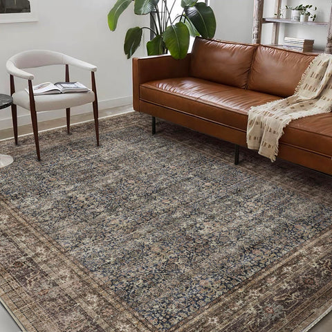 Champlant rug close-up floral pattern highlights soft faux wool texture.