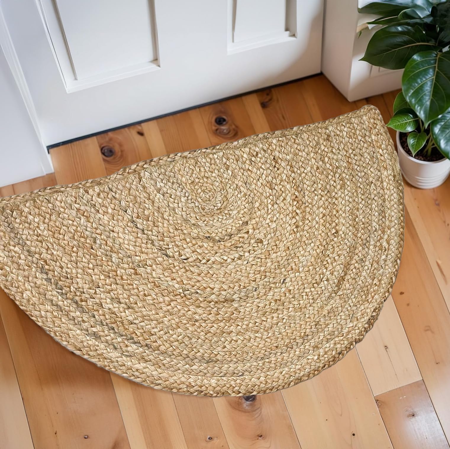 Chardin Home half-moon jute rug close-up of braided texture for rustic warmth
