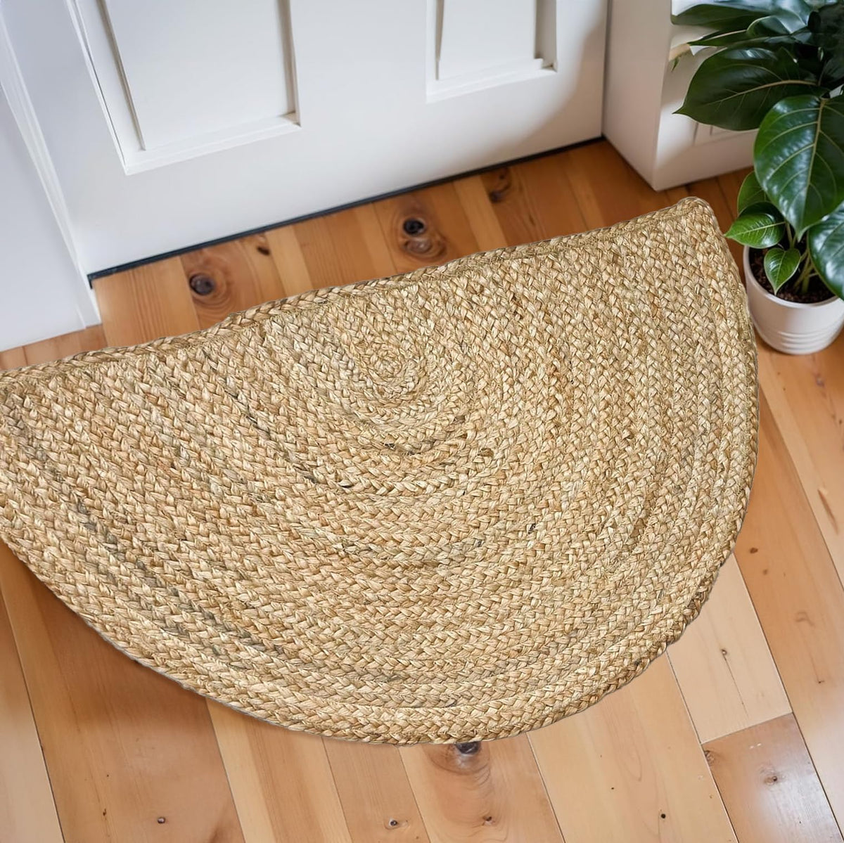 Chardin Home half-moon jute rug close-up of braided texture for rustic warmth