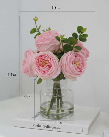 Lifelike faux flowers as a dining table centerpiece by CHASMILE