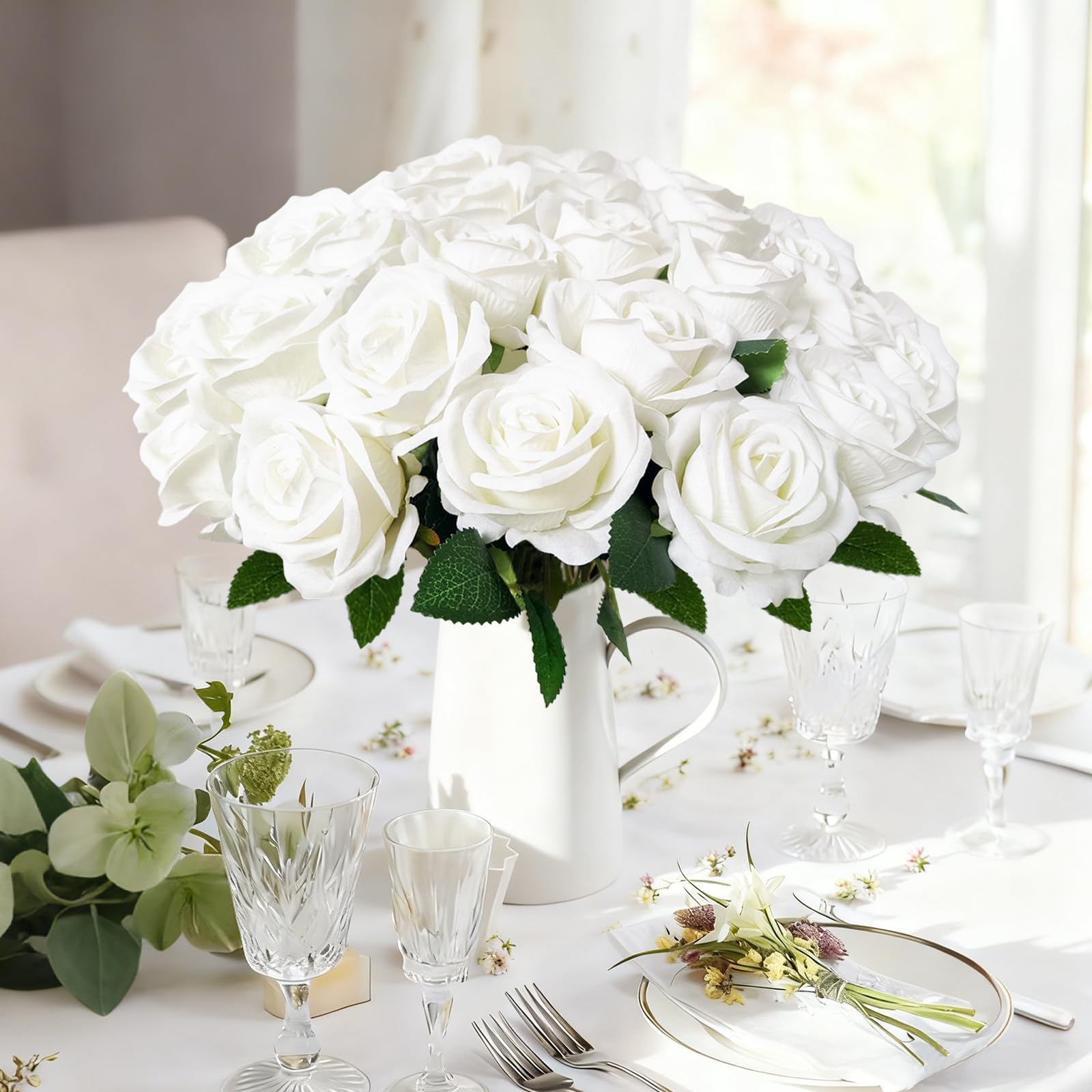 Cherica wedding centerpiece ideas with timeless white roses.