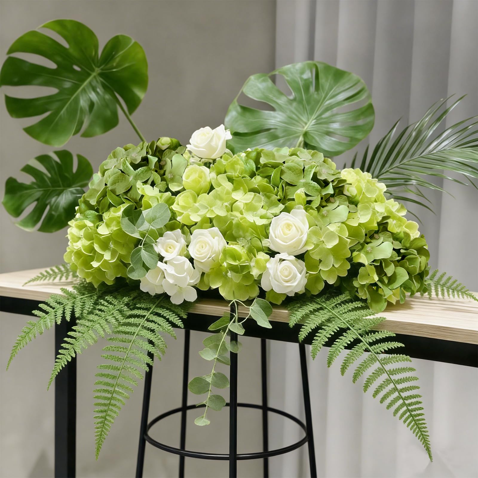 Cherica wedding centerpiece hydrangea flowers add soft color and texture.