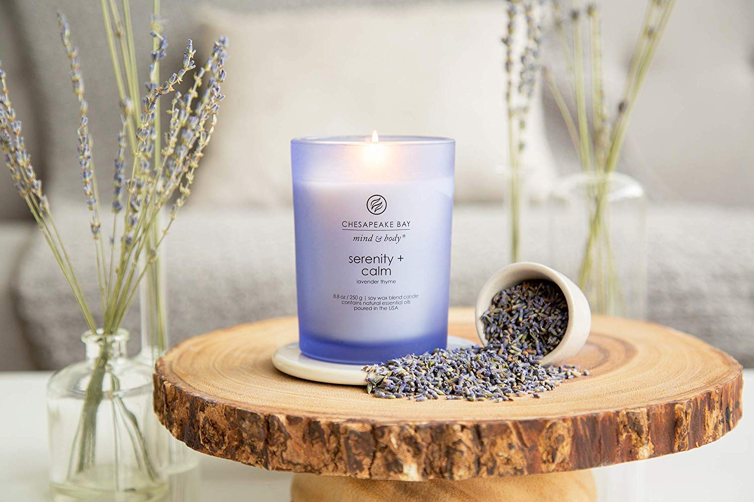 Chesapeake Bay Candle Serenity Calm wick self-trimming feature visible in action.
