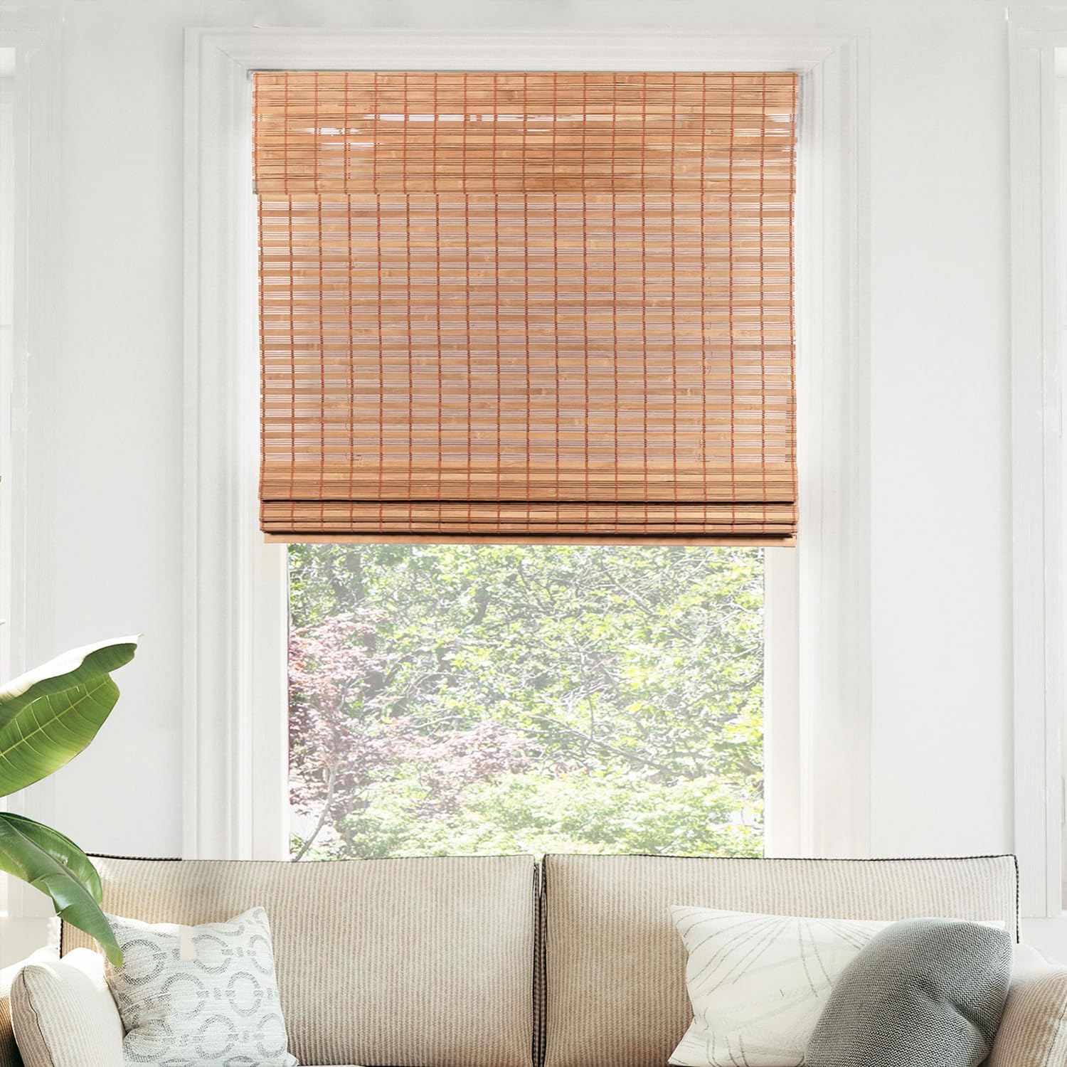 CHICOLOGY Bamboo Roman Shade light-filtering creates a warm glow in living spaces.