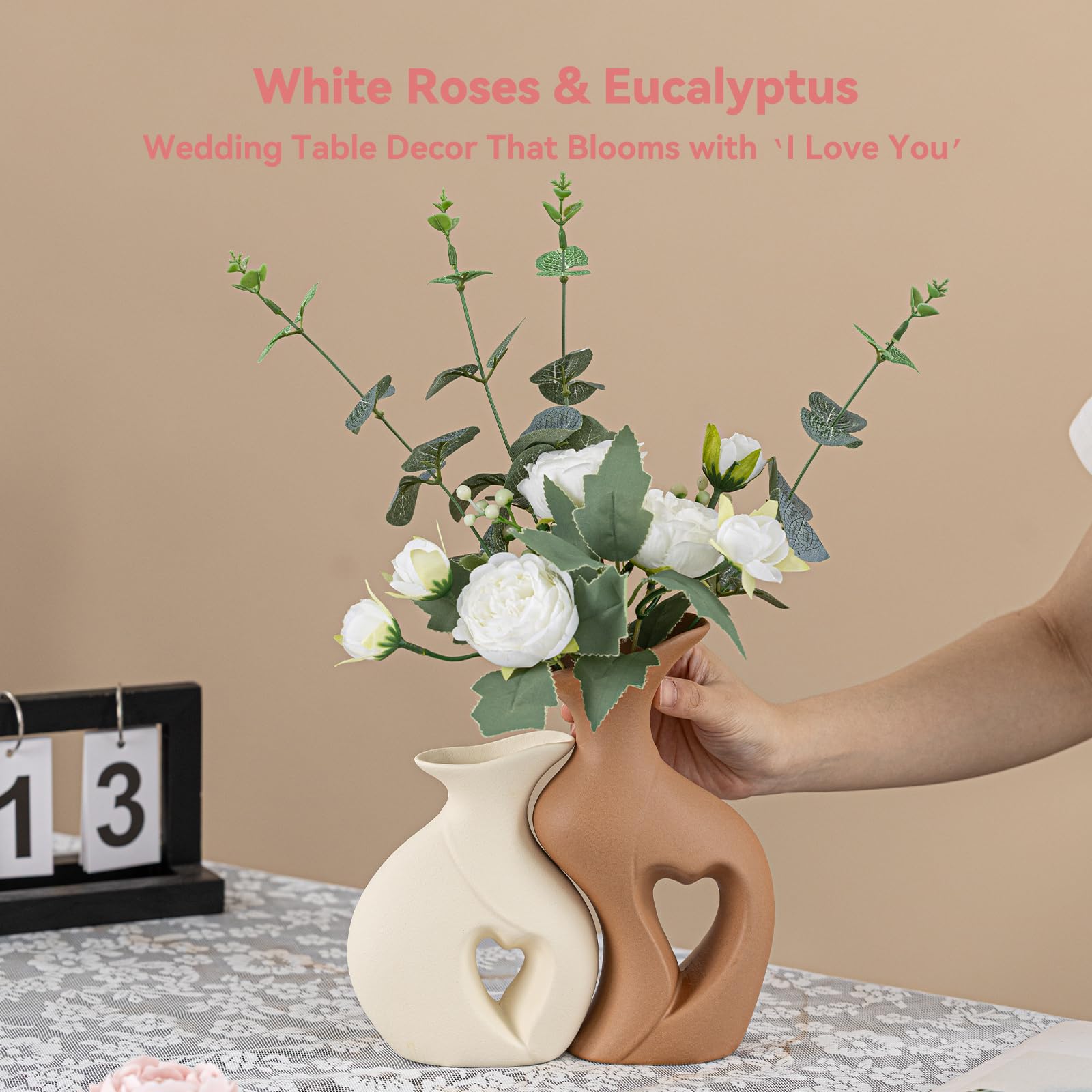 ChifonCyan hollow heart cutouts on linked vases at close view