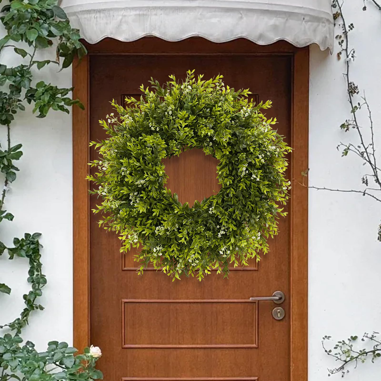 Chiyinbao boxwood wreath on window enhances exterior decorative detail