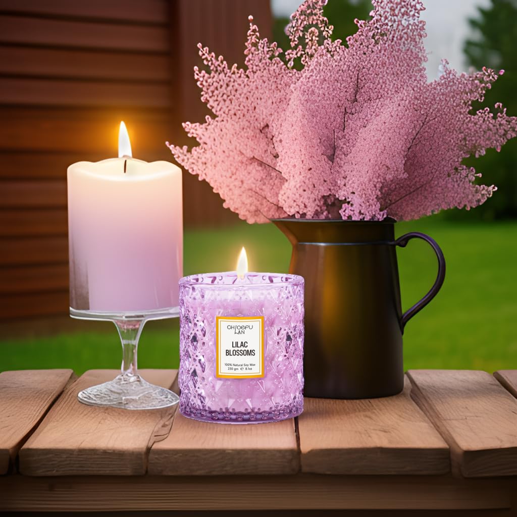 Chloefu LAN candle on a wood table evokes coziness.
