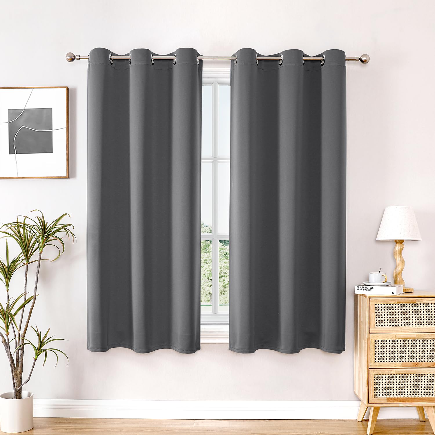 ChrisDowa blackout curtains with 6 silver grommets for easy installation and privacy.