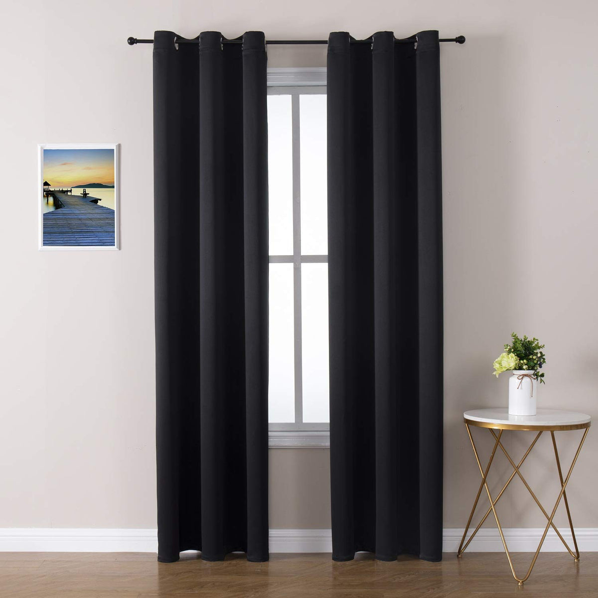 ChrisDowa grommet blackout curtains in a 2-panel setup for easy installation and full coverage.