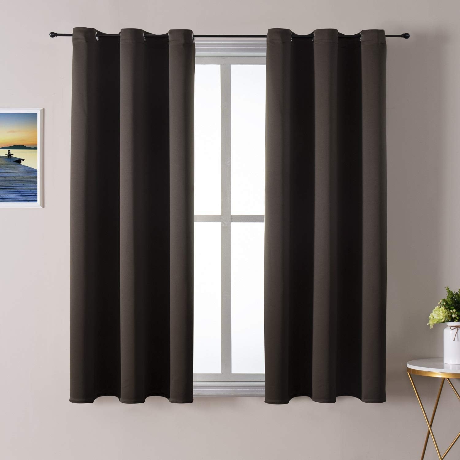 ChrisDowa grommet curtains with easy installation and smooth sliding.