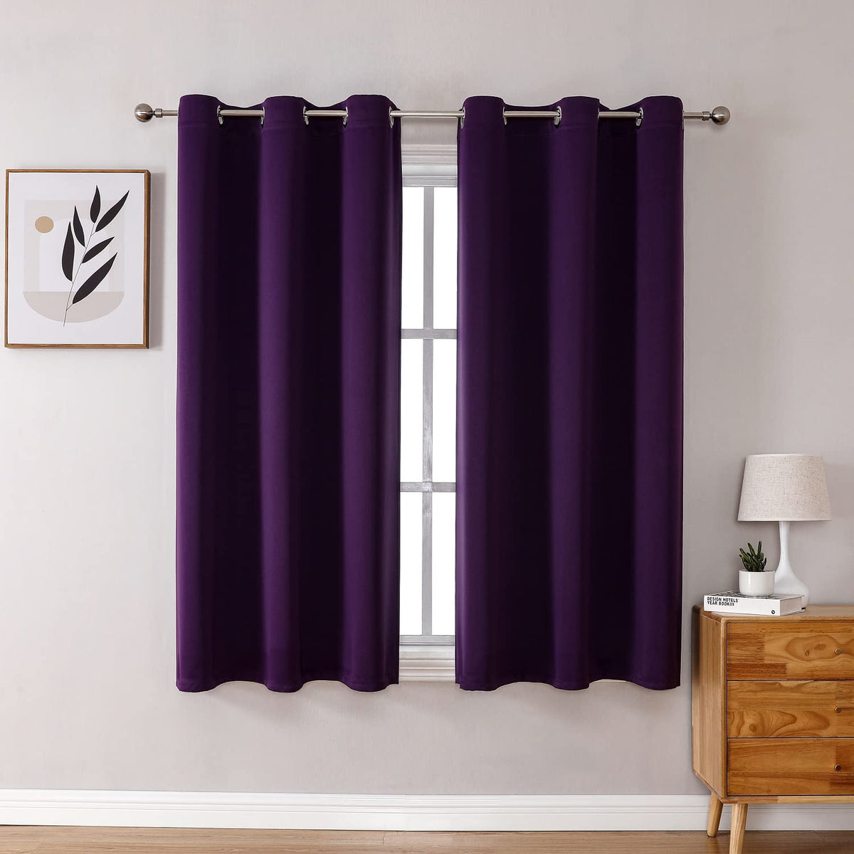 ChrisDowa grommet curtains in royal purple panel blocking light for restful mornings.