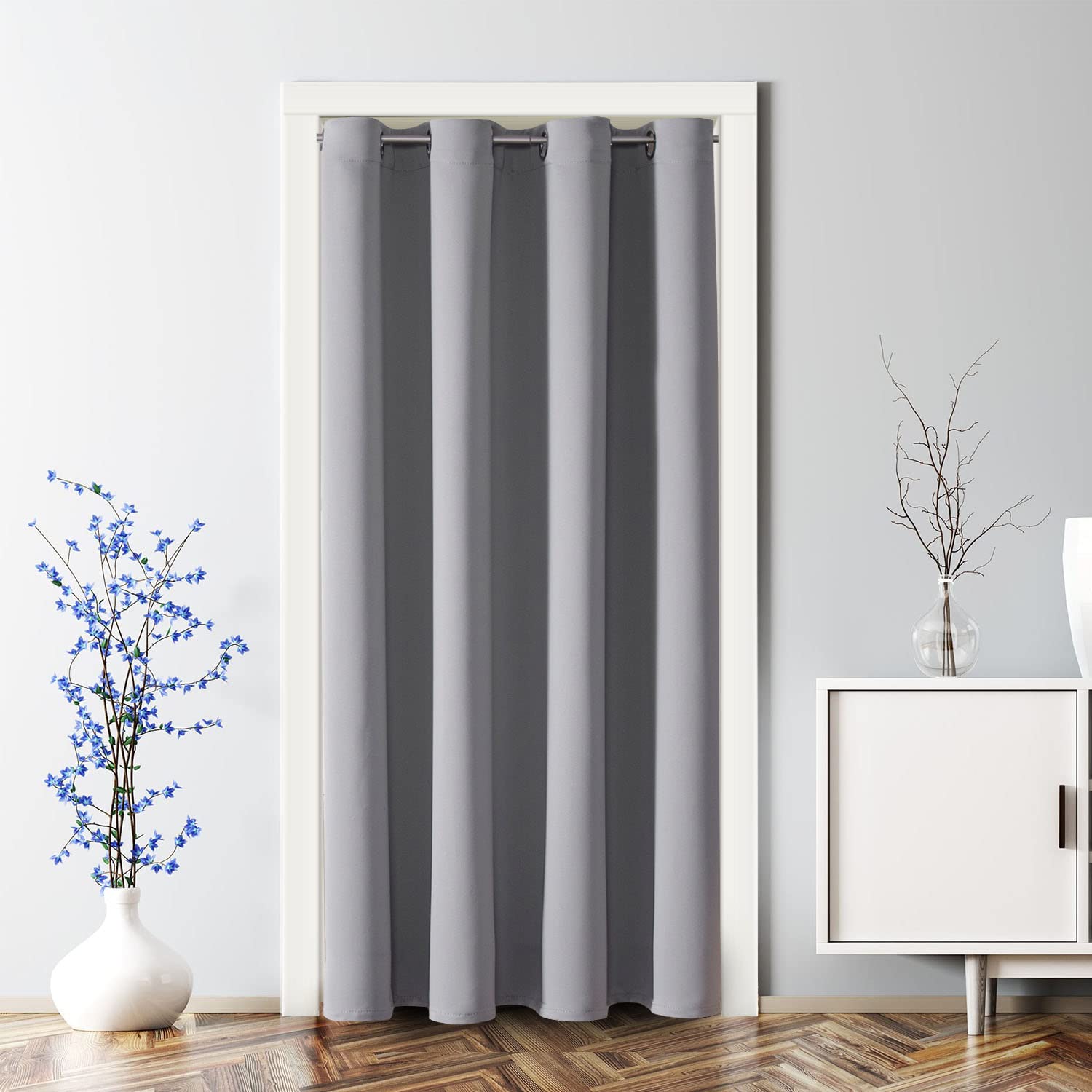 ChrisDowa light-gray door curtain with grommets for smooth sliding and privacy.