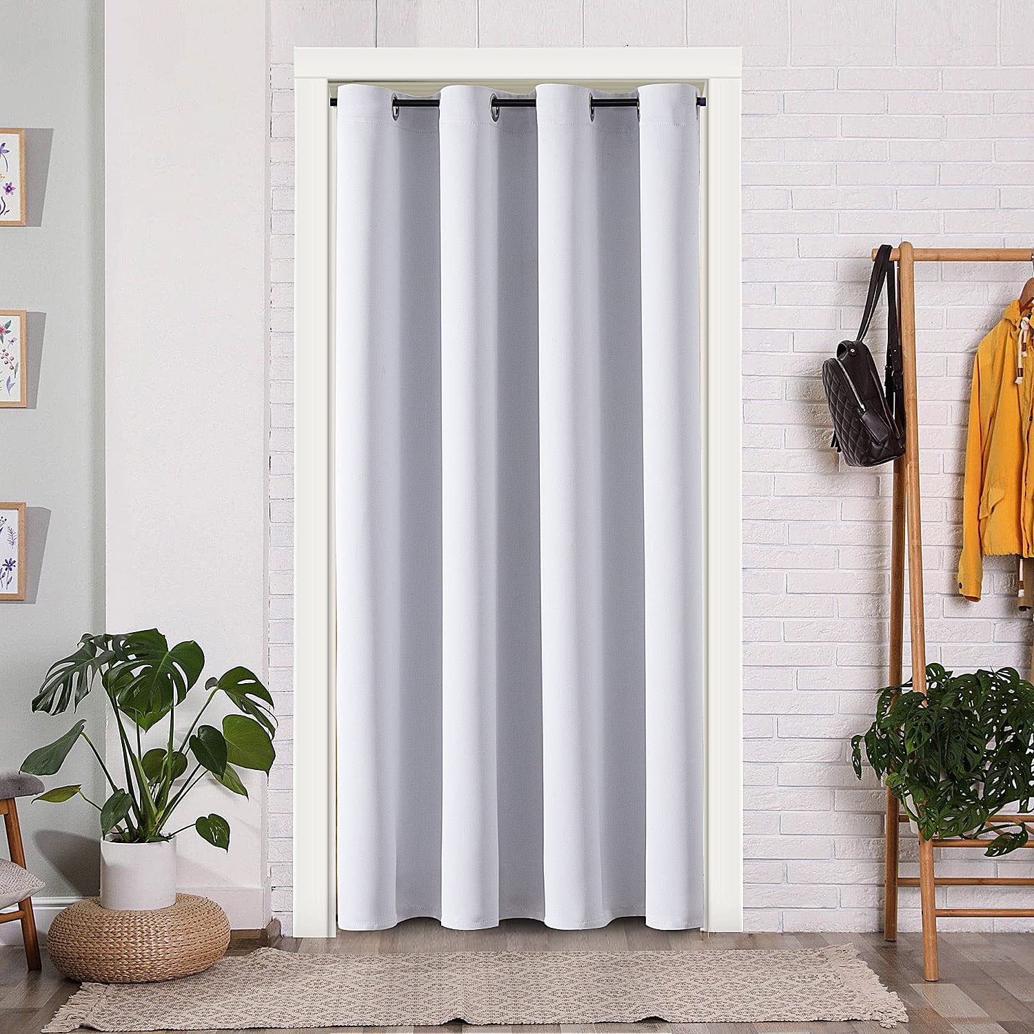 ChrisDowa room divider creates private spaces in open-plan layouts.