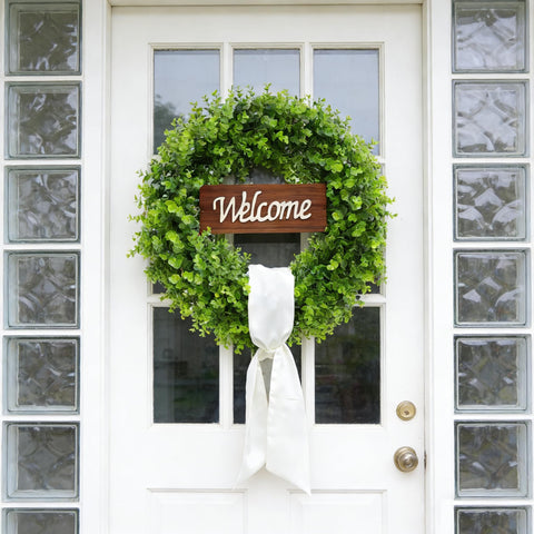 Handcrafted leaves and vines on ChrisXiao wreath evoke fresh greenery all year