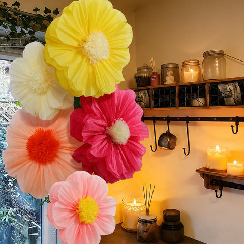 Chunful fiesta backdrop with hanging tissue flowers for photos