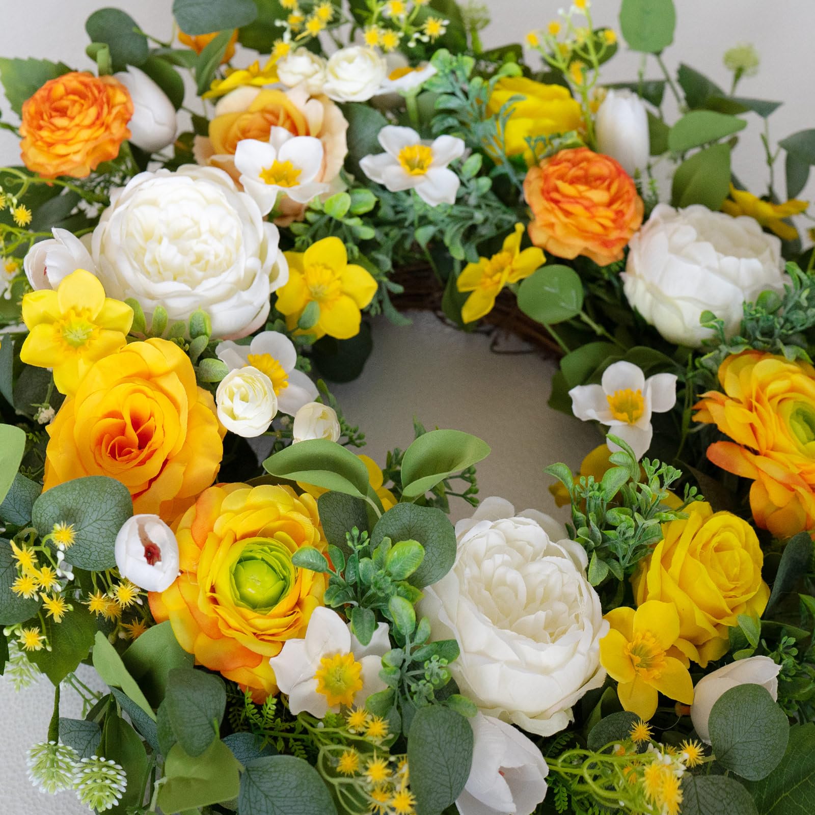 CHvista spring wreath displayed on front door for curb appeal.