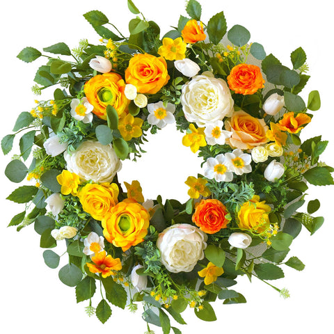 Seasonal CHvista spring-summer wreath arrangement enhances entry décor.