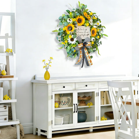 Front door display using CHvista spring wreath adds seasonal charm.