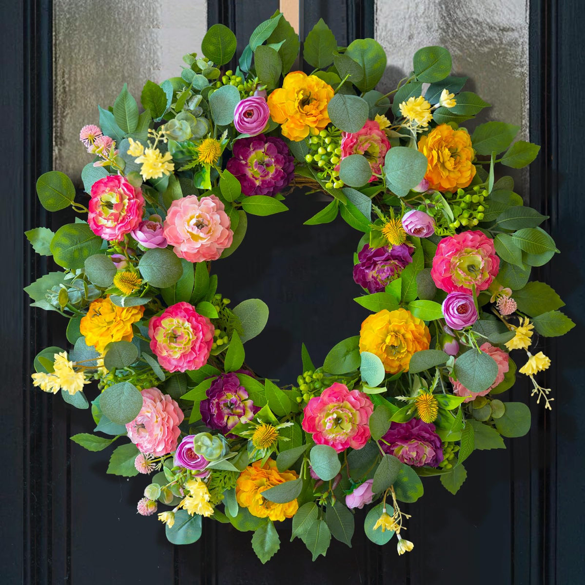 CHvista Spring Wreath on front door featuring peony, rose and ranunculus for a welcoming entry