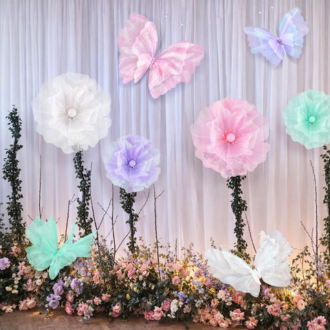 Cinnvoice 12-inch pink butterfly flower decor offers charming focal points for parties.