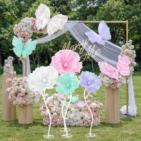 Cinnvoice 12-inch white butterfly flower decor creates delicate accents on tables.