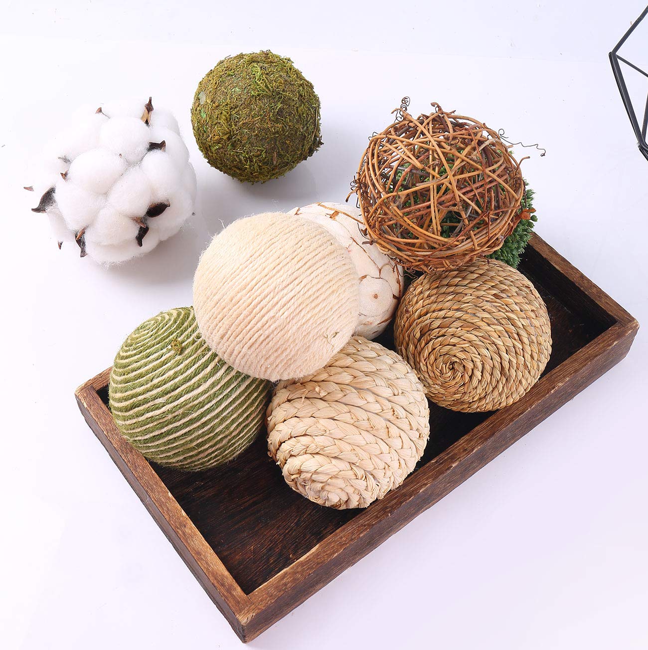 Cir Oases vase fillers in woven rattan for warm table arrangements