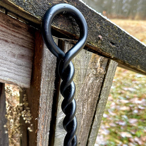 CKLT fire poker with round rope handle offers long reach for controlled flames.