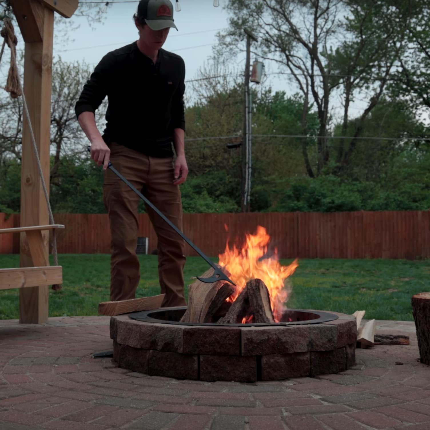 CKLT fire poker set at a campfire showing control of flames.